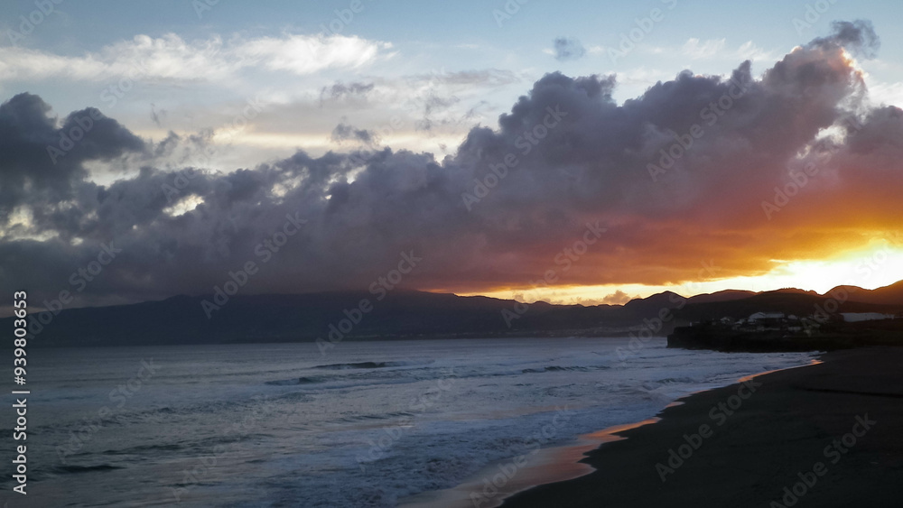 Fototapeta premium Beautiful sunset over beach in Ribiera Grande, Atlantic Ocean, Azores Islands.