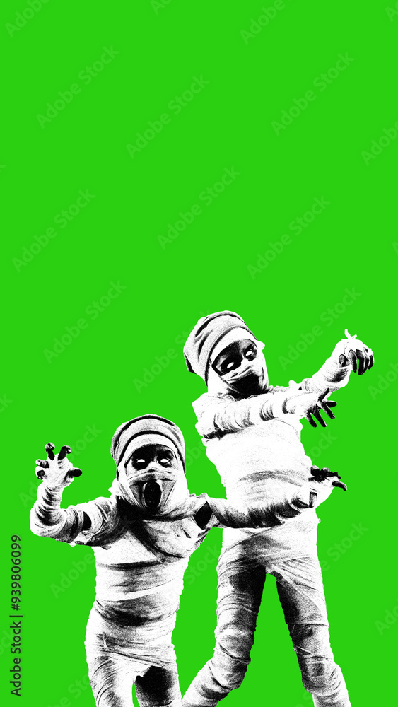Two children dressed as mummies, striking playful poses against bright green background, mixing spooky with youthful energy. Contemporary art collage. Concept of Halloween, holiday, spooky season Two children dressed as mummies, striking playful poses against bright green background, mixing spooky with youthful energy. Contemporary art collage. Concept of Halloween, holiday, spooky season