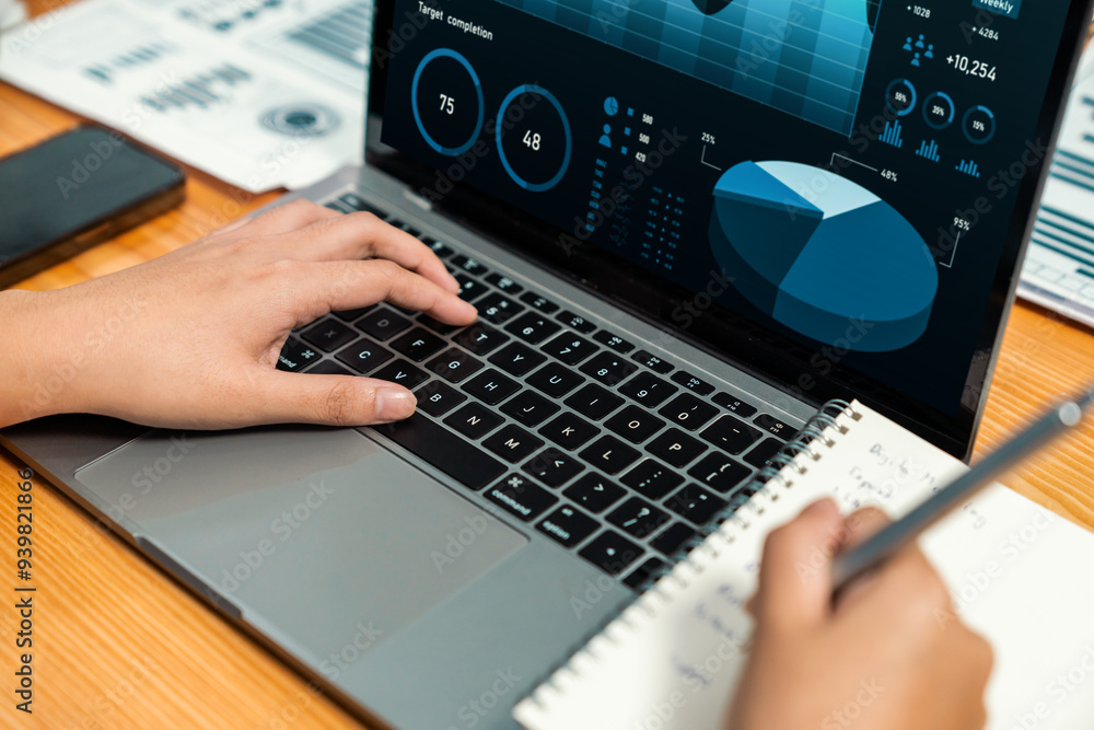 Financial data analysis dashboard by Fintech BI or business intelligence display on laptop screen to in-depth financial data analysis by business people working on business marketing. Habiliment Financial data analysis dashboard by Fintech BI or business intelligence display on laptop screen to in-depth financial data analysis by business people working on business marketing. Habiliment