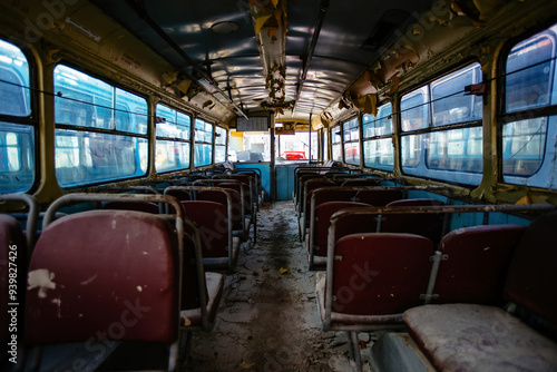Inside old abandoned rusty wrecked bus or trolleybus