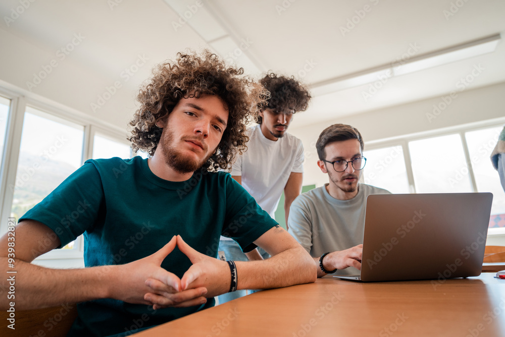 A group of diverse college students studying together or a business team working together on a project plan in the office workplace. A group of diverse college students studying together or a business team working together on a project plan in the office workplace.