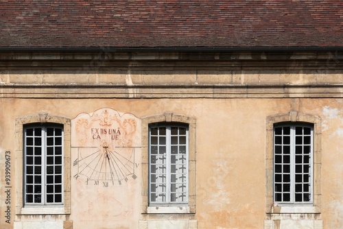 Sundial on the wall of the Cluny abbey in France photo