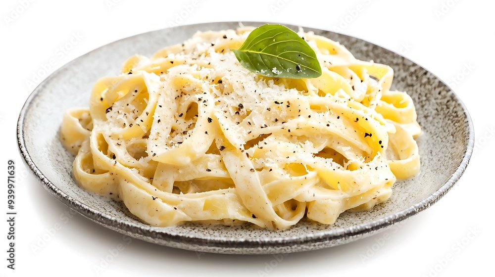 Fettuccine creamy sauce with parmesan cheese on plate isolated on white background.,italian food Fettuccine creamy sauce with parmesan cheese on plate isolated on white background.,italian food