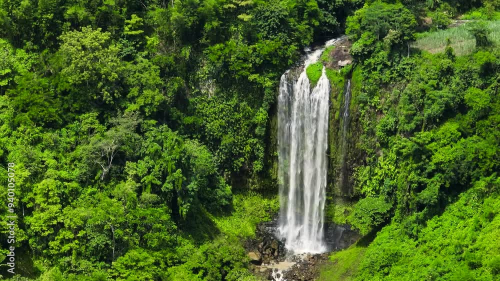 Beautiful white water cascade in Lasang Falls. Mountain with tropical waterfalls. Bukidnon, Philippines. Beautiful white water cascade in Lasang Falls. Mountain with tropical waterfalls. Bukidnon, Philippines.