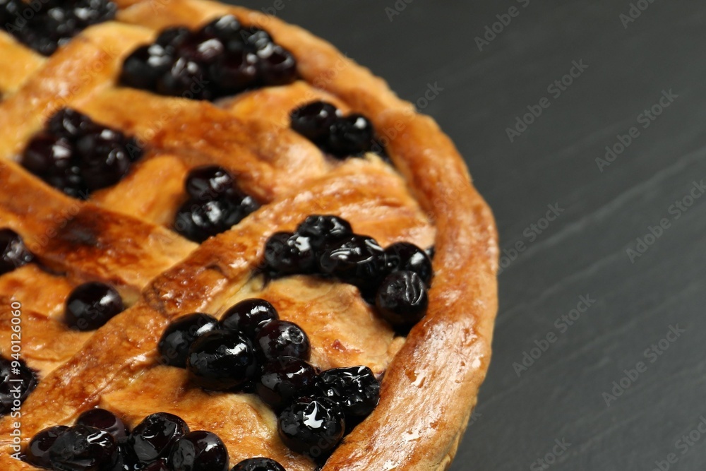 Tasty homemade pie with blueberries on grey table, closeup Tasty homemade pie with blueberries on grey table, closeup