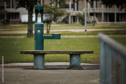 Bench and Water Fountain at Public Park