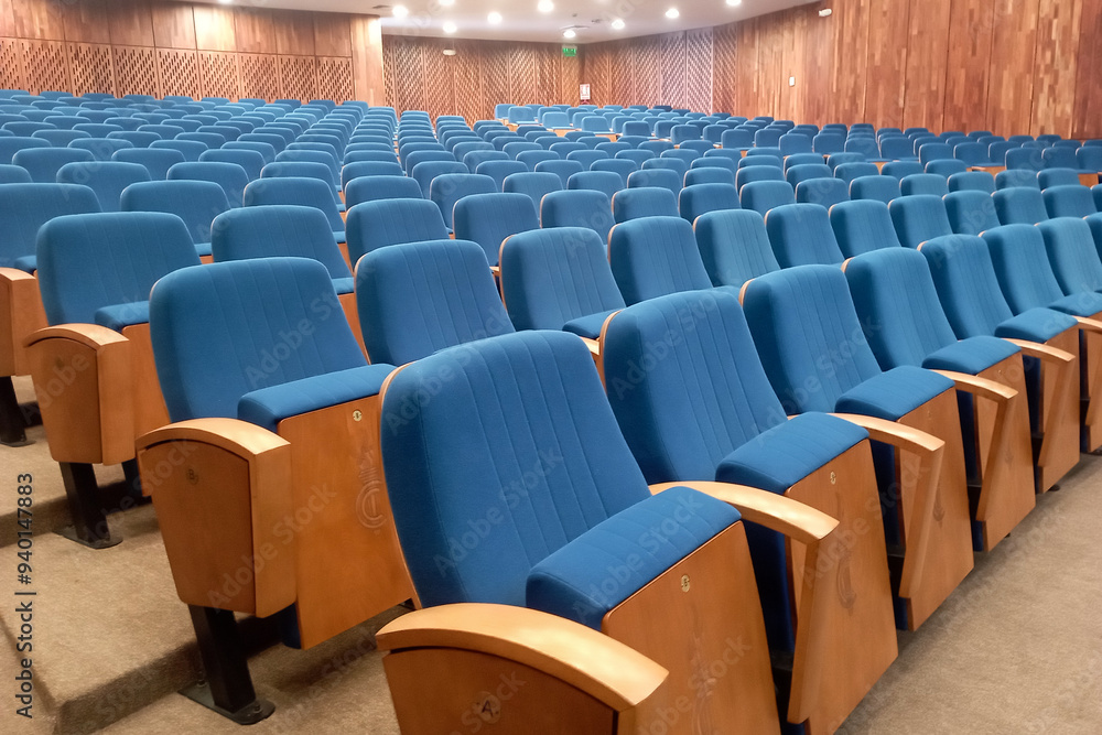 Naklejka premium Blue empty seats in auditorium. 