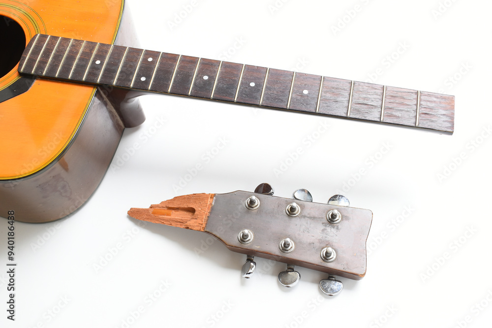 part of broken wood acoustic guitar isolated on white background part of broken wood acoustic guitar isolated on white background