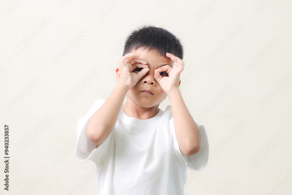 Image of Asian child posing on white background. Image of Asian child posing on white background.