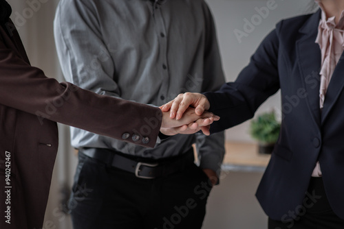 Business handshake for teamwork of business merger and acquisition,successful negotiate,hand shake,two businessman shake hand with partner to celebration partnership and business deal concept 