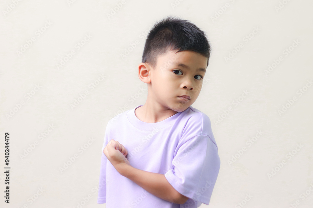 Happy Asian children showing her strong hands. Happy Asian children showing her strong hands.