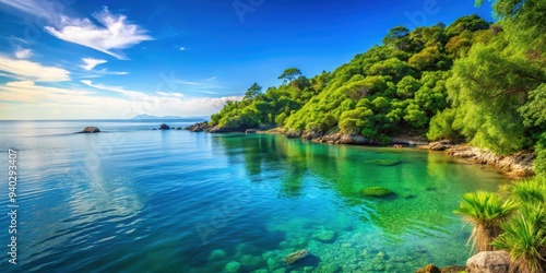 Tranquil coastal scene with lush greenery, calm waters, and clear blue skies , coastal, beauty, greenery, reflections, sunny