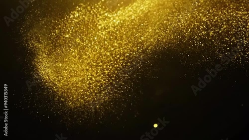 sparkling gold dust on a black background footage