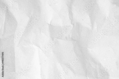 White recycled craft paper texture as background. Grey paper texture, Old vintage page or grunge vignette of old newspaper. Pattern rough art creased grunge letter. Hardboard with copy space for text.