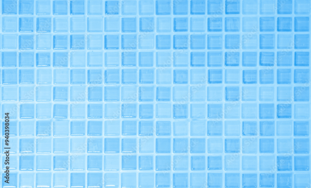 Blue light ceramic wall chequered and floor tiles mosaic background in bathroom. Design pattern geometric with grid wallpaper texture decoration pool. Simple seamless abstract surface clean. Blue light ceramic wall chequered and floor tiles mosaic background in bathroom. Design pattern geometric with grid wallpaper texture decoration pool. Simple seamless abstract surface clean.