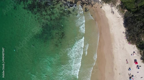 Aerial top down over Cabarita beach, following up the path to the top of Norries Headland. photo