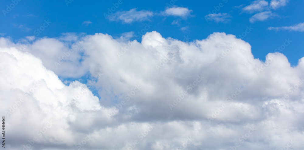 White clouds against a blue sky