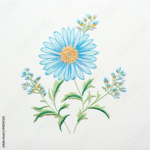 A beautifully embroidered blue flower with green leaves on a white background, ideal for showcasing embroidery techniques, crafts, textile design, and DIY projects,