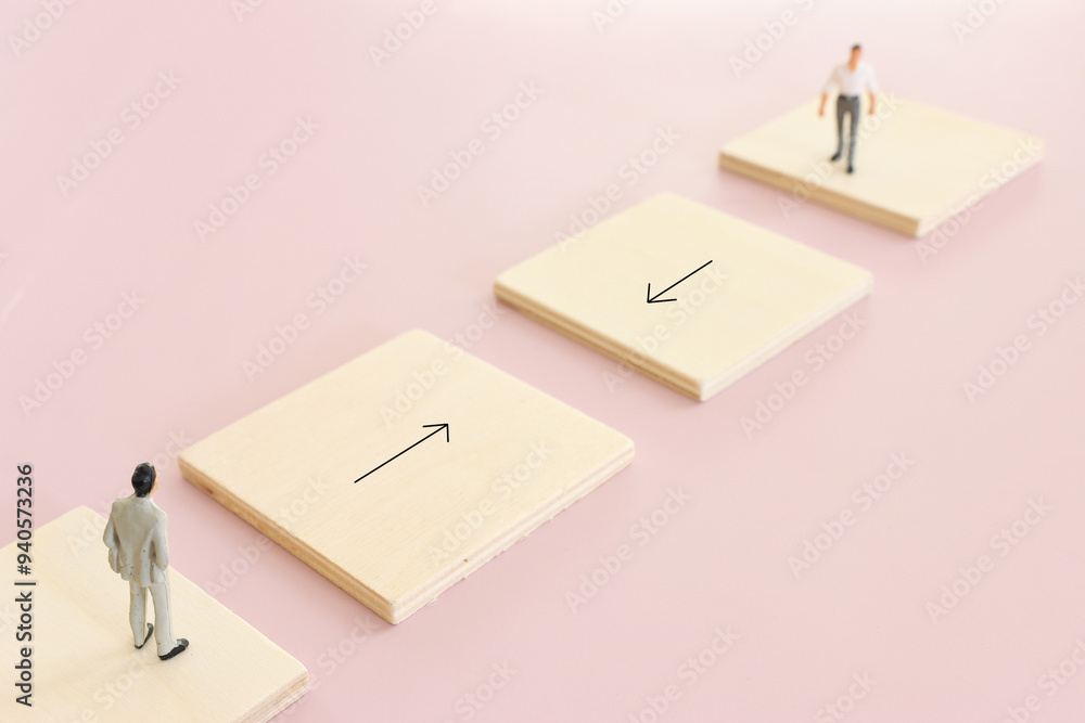 two miniature figures need to find the way to each other. Concept of collaboration and teamwork two miniature figures need to find the way to each other. Concept of collaboration and teamwork