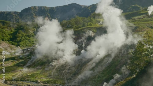 steam comes out of the ground, valley of geysers