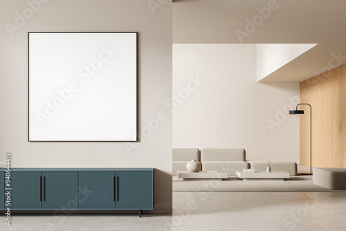 Minimalist living room with blank framed poster on the wall. 3D Rendering