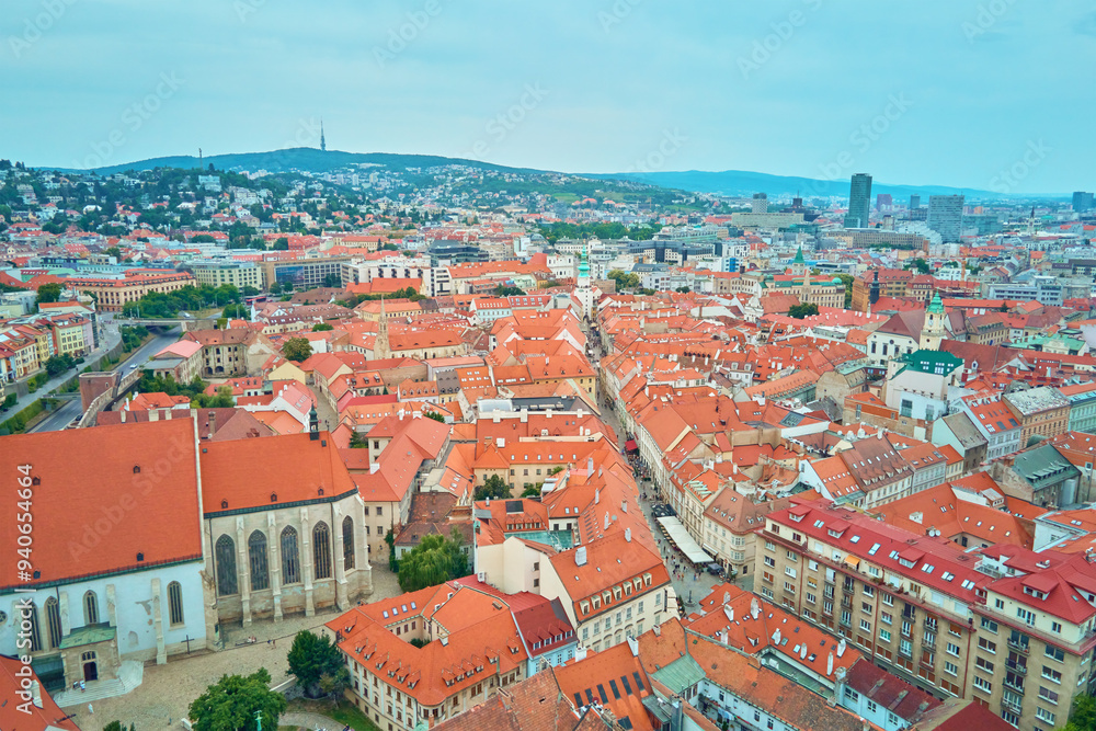 Panorama of Bratislava, Slovakia. Aerial view of historic European city with vibrant red rooftops. Urban landscape with historaical buildings Panorama of Bratislava, Slovakia. Aerial view of historic European city with vibrant red rooftops. Urban landscape with historaical buildings