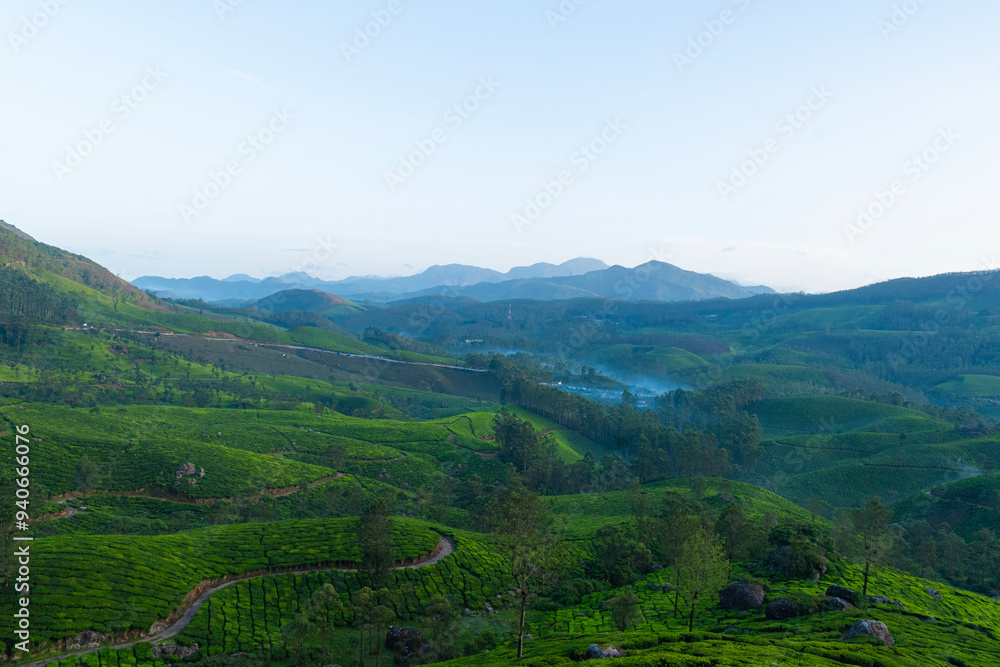 Mountain ranges covered in fog in Munnar which is one of the beautiful and romantic tourist locations in Kerala, India. Clicked on 08-22-2023 Mountain ranges covered in fog in Munnar which is one of the beautiful and romantic tourist locations in Kerala, India. Clicked on 08-22-2023