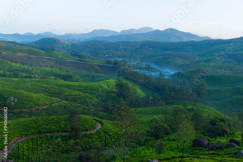 Mountain ranges covered in fog in Munnar which is one of the beautiful and romantic tourist locations in Kerala, India. Clicked on 08-22-2023