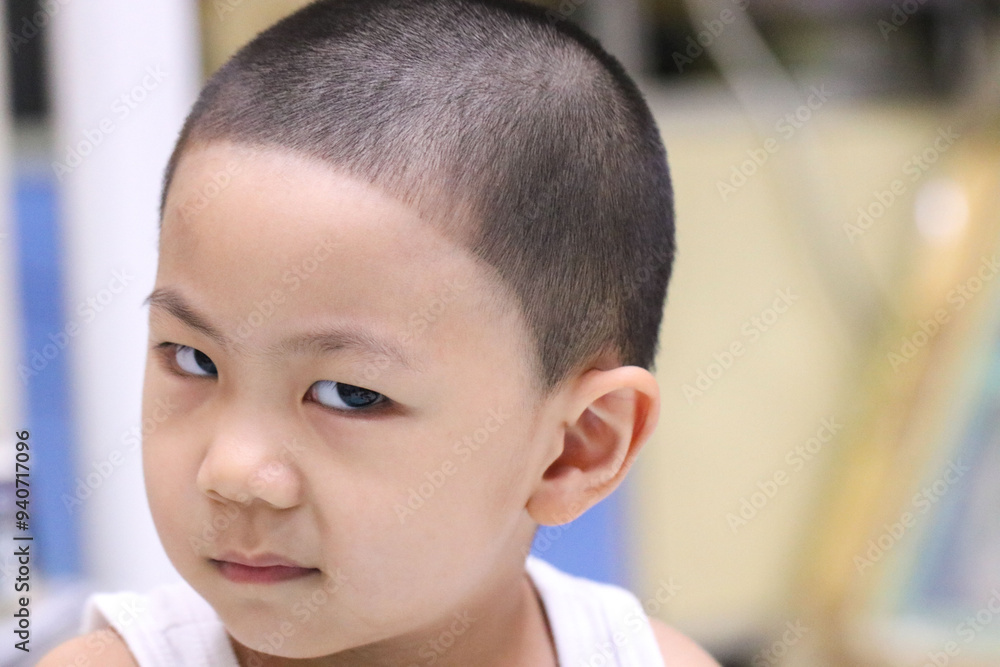 Cute boy making cheeky face, asian, close up. Cute boy making cheeky face, asian, close up.
