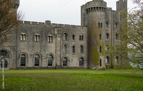 A view of Penrhyn Castle, an extensive medieval country house in Llandygai, Bangor, North Wales, in the form of a Norman castle. photo