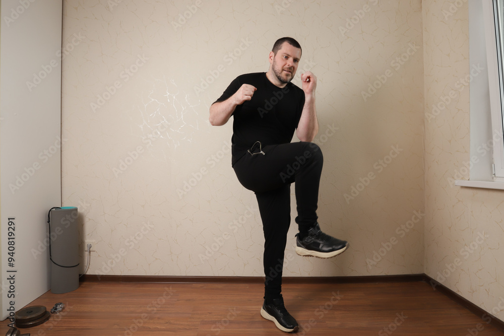 Man exercising in home gym, engaged in body training with equipment, embodying an active and strong lifestyle. Man exercising in home gym, engaged in body training with equipment, embodying an active and strong lifestyle.