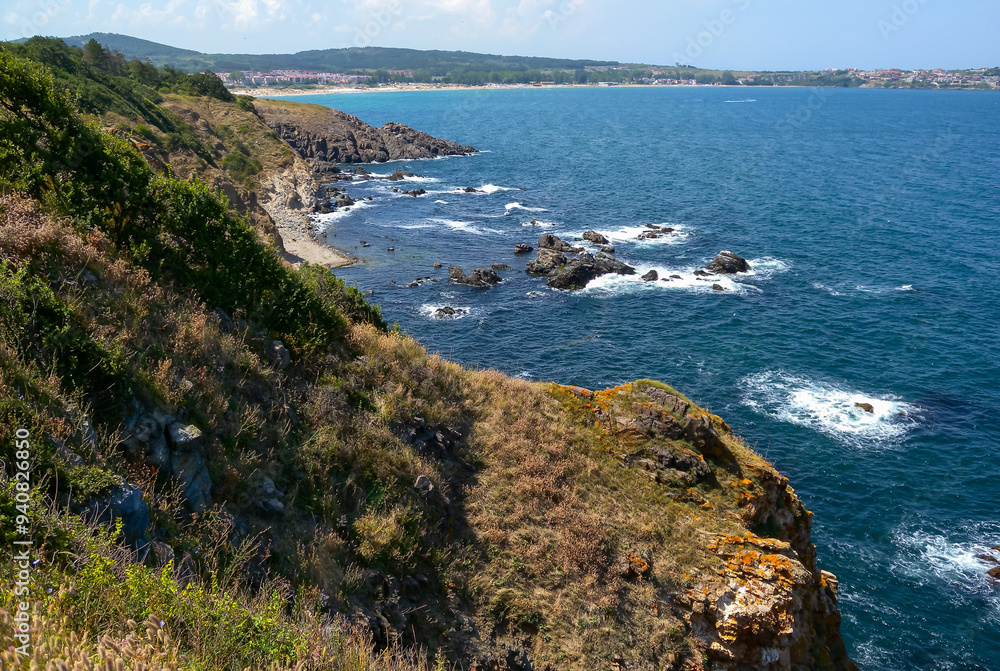 Seascape on the Black Sea, high steep stone coast with inaccessible rocks Seascape on the Black Sea, high steep stone coast with inaccessible rocks