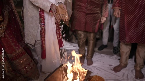 A shot of an Indian Wedding where rituals are being performed in India
 photo