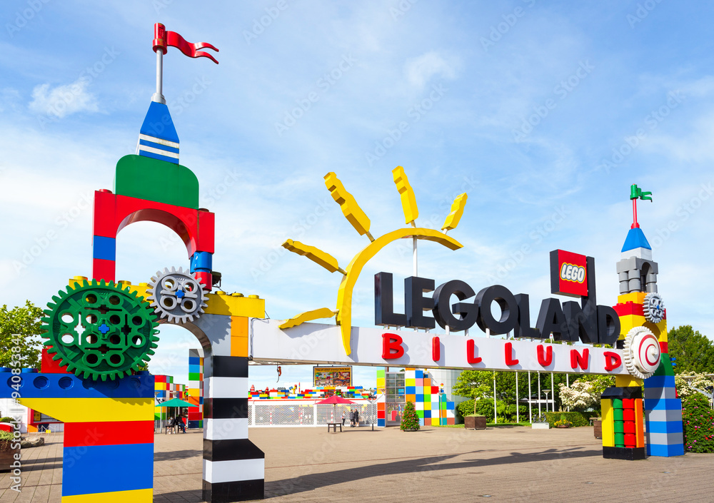 Fototapeta premium Billund, Denmark - July 14, 2024: Entrance gate of the original Legoland park, opened in 1968, first of a chain of family amusement parks focusing on the Lego building toy brand.