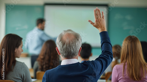 old man student rise the hand students in classroom