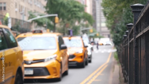 New York City Park Avenue. Grand Central Terminal railway station on 42 street. Manhattan Midtown. Yellow taxi cab in NYC, USA. American urban road car traffic, transport in United States. Defocused.