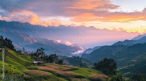 A picturesque view of Coroico Valley at sunset, with the surrounding mountains glowing under the fading light.