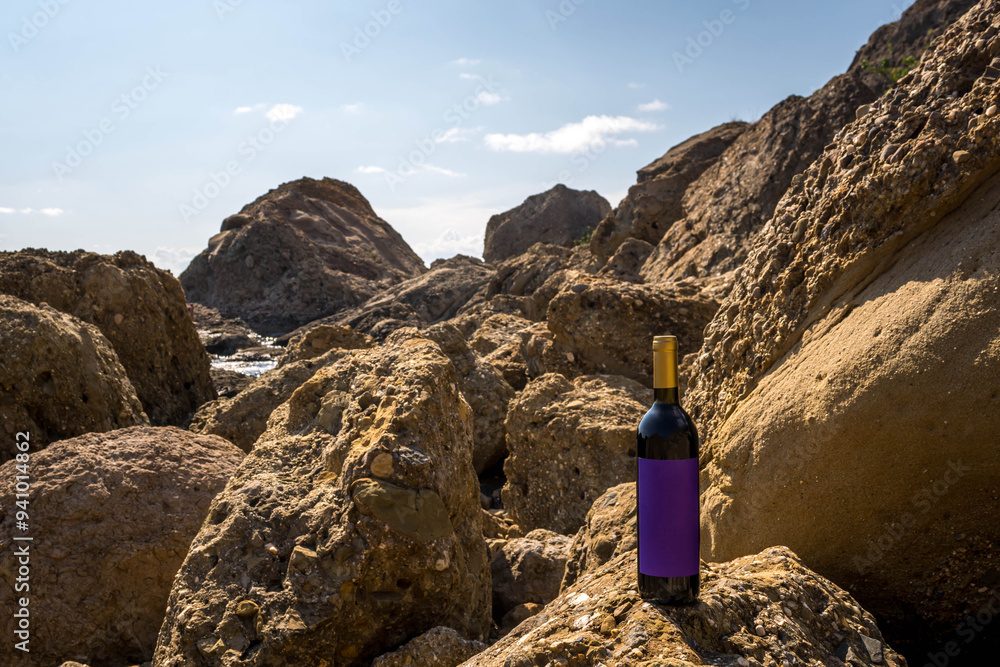 Bottle of wine by the sea