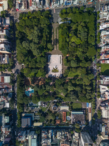 Le Van Tam Park top down aerial view surrounded by buildings in Ho Chi Minh City, Vietnam. Part of the old city of Saigon. Photo taken on sunny morning.close up view.