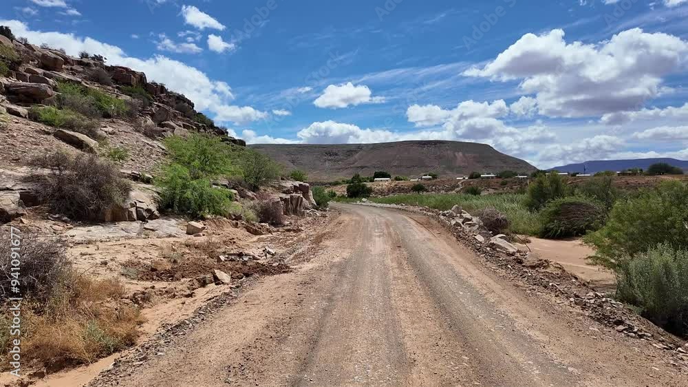 Clanwilliam Cederberg South Africa. 27.03.2024. Video. Landscape over the Agter Pakhuis valley along the Vieiplaas mountain pass on dirt road. Clanwilliam Cederberg South Africa. 27.03.2024. Video. Landscape over the Agter Pakhuis valley along the Vieiplaas mountain pass on dirt road.