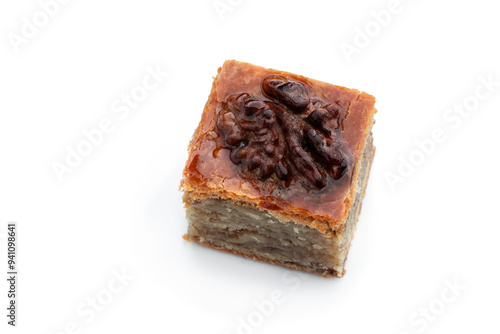 Homemade walnuts and honey baklava isolated on white