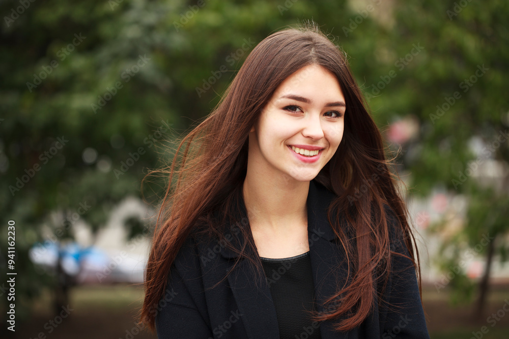 Young beautiful brunette girl in the autumn park Young beautiful brunette girl in the autumn park