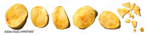Potato chips, collection of homemade rustic chip isolated on white background, close up. Golden deep fried cutout chips set for your design. Flat lay