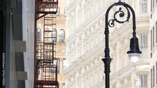 New York City Lower Manhattan, Downtown Financial District architecture, United States. High-rise residential and office buildings, USA. American urban street, real estate, realty in NYC. Old lantern. photo