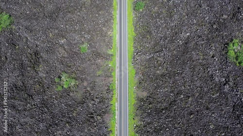 El Ceboruco Nayarit se encuentra al sur y es parte del eje neovolcánico mexicano. Cuenta con una lava extrañamente negra que cubre una carretera por ambos lados. es la erupción de un volcán.  photo