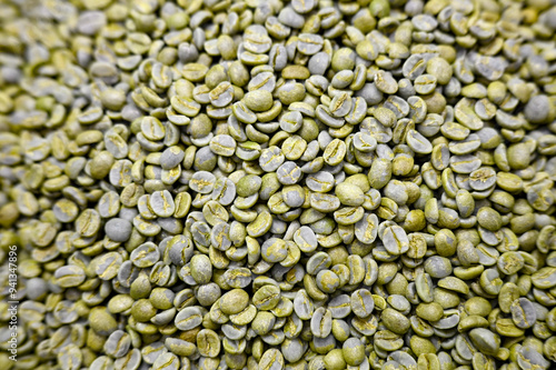 Heap of Green unroasted coffee beans photo