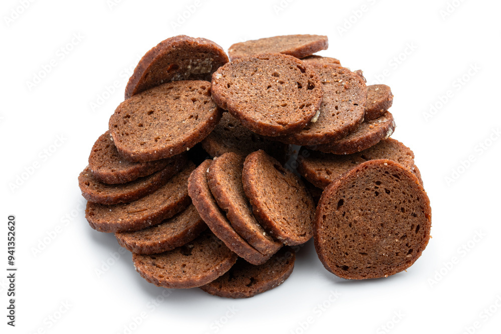 Rye bread crackers in paper bowl isolated on white background Rye bread crackers in paper bowl isolated on white background