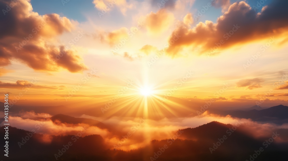 A breathtaking sunrise illuminating the mountains, casting golden rays through soft clouds and creating a serene atmosphere. A breathtaking sunrise illuminating the mountains, casting golden rays through soft clouds and creating a serene atmosphere.