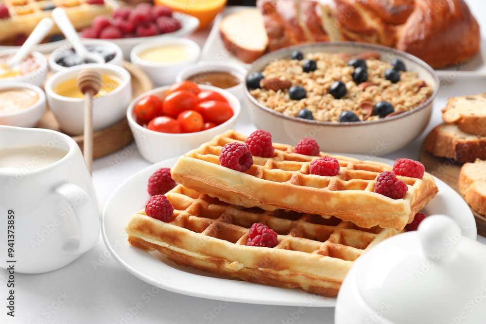 Different meals served for breakfast on white table, closeup. Buffet menu Different meals served for breakfast on white table, closeup. Buffet menu