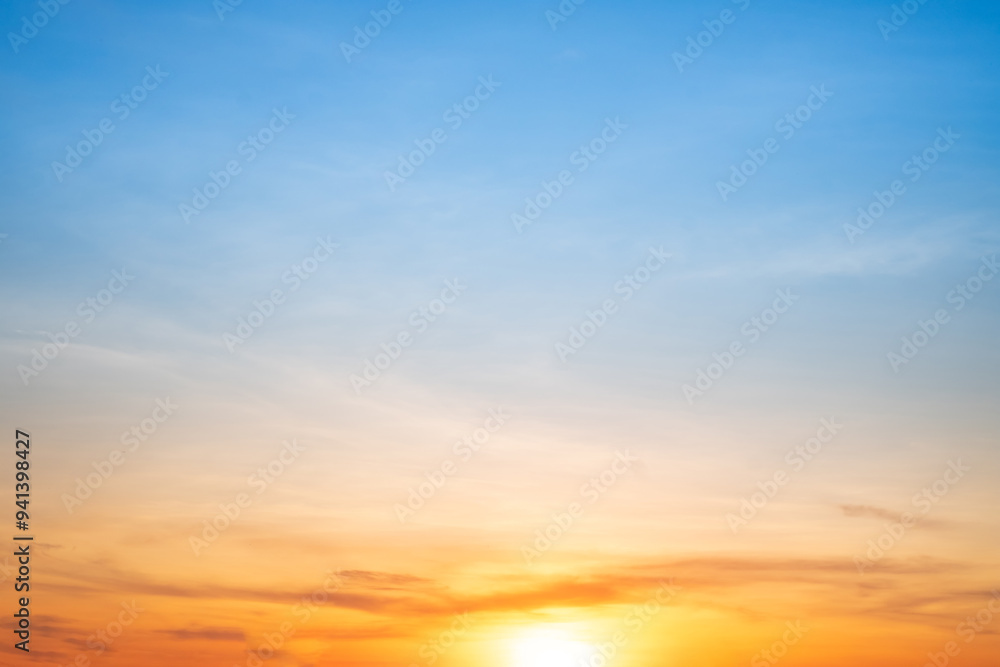 Beautiful , luxury soft gradient orange gold clouds and sunlight on the blue sky perfect for the background, take in everning,Twilight, Large size, high definition landscape photo Beautiful , luxury soft gradient orange gold clouds and sunlight on the blue sky perfect for the background, take in everning,Twilight, Large size, high definition landscape photo